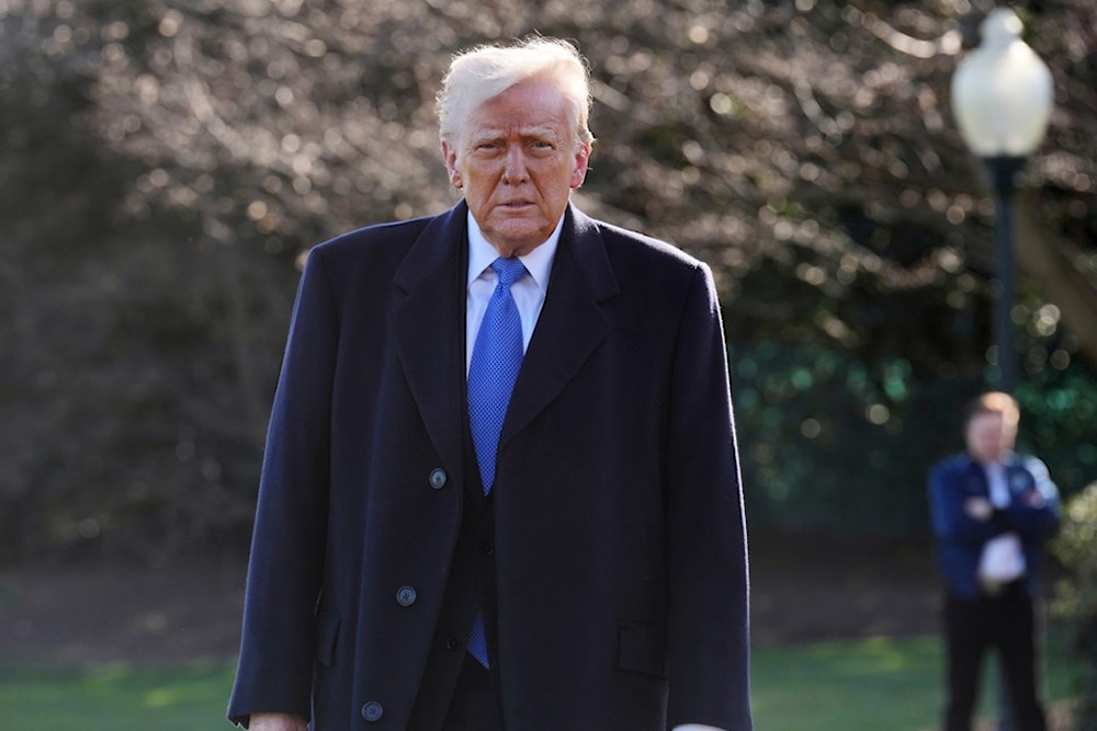 President Donald Trump walks to speak with reporters before leaving the White House, Friday, March 21, 2025, in Washington, en route to New Jersey. (AP Photo/Jacquelyn Martin)
