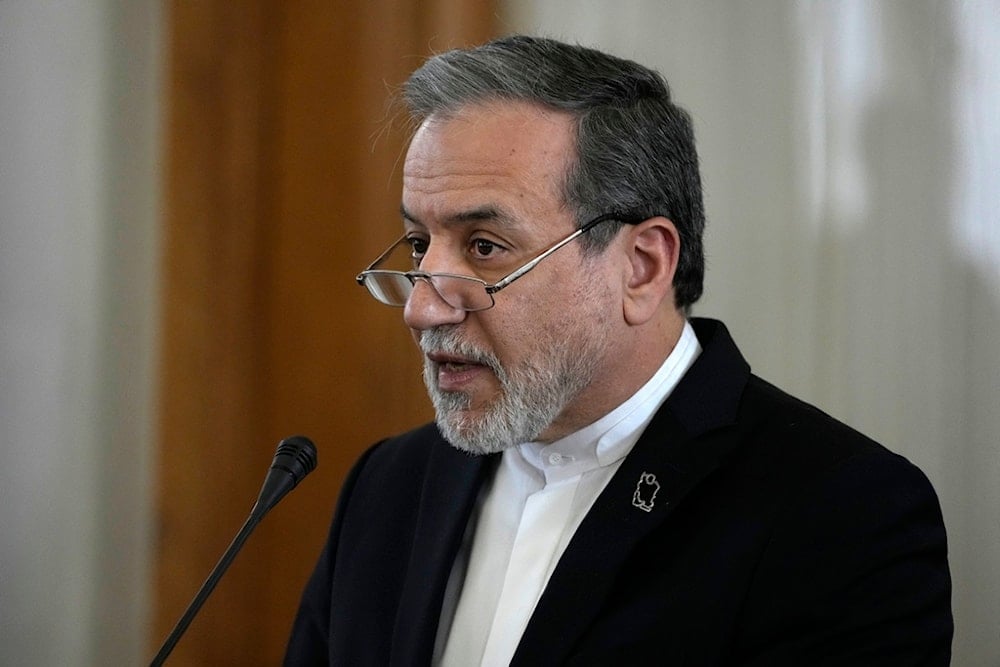 Iranian Foreign Minister Abbas Araghchi speaks in a joint press briefing with his Omani counterpart Sayyid Badr Albusaidi after their meeting in Tehran, Iran, Monday, December 30, 2024 (AP)