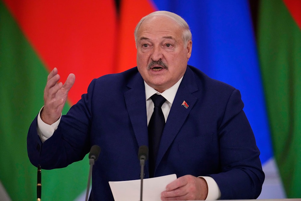 Belarusian President Alexander Lukashenko speaks during a joint news conference with Russian President Vladimir Putin following their talks at the Grand Kremlin Palace in Moscow, Russia, Thursday, March 13, 2025. (AP Photo/Alexander Zemlianichenko)