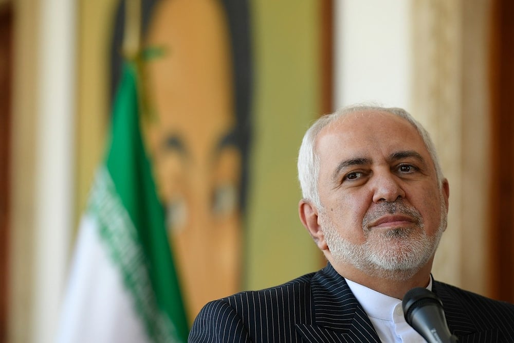 Iran's Foreign Minister Mohammad Javad Zarif attends a news conference with Venezuela's Foreign Minister Jorge Arreaza at the Foreign Ministry in Caracas, Venezuela, Thursday, Nov. 5, 2020 (AP)