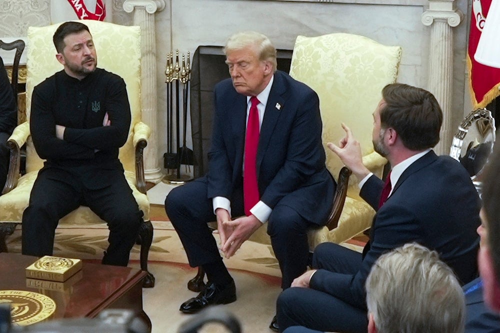 Vice President JD Vance, right, speaks with Ukrainian President Volodymyr Zelenskyy, left, as President Donald Trump listens in the Oval Office at the White House, Friday, Feb. 28, 2025, in Washington (AP)
