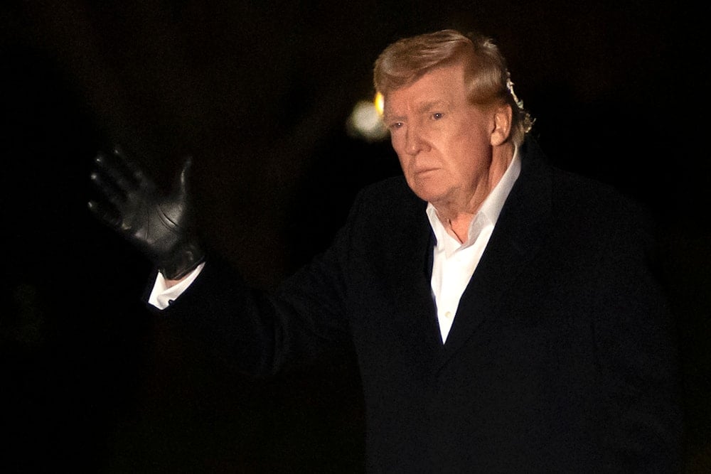 President Donald Trump gestures as he walks across the South Lawn of the White House, Sunday, March 2, 2025, in Washington, after returning from a trip to Florida (AP)
