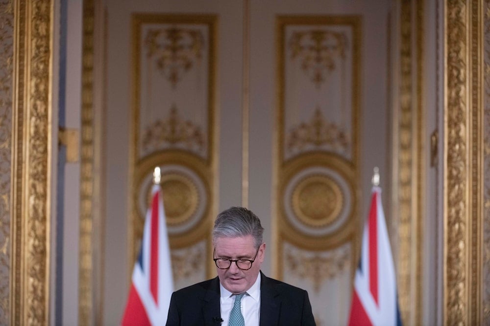 Britain's Keir Starmer speaks at a press conference as he hosts a European leaders' summit to discuss Ukraine, at Lancaster House in London, Sunday March 2, 2025 (AP)