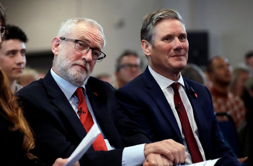 British opposition Labour party leader Jeremy Corbyn, sits next to Keir Starmer, Labour's Shadow Secretary of State for Exiting the European Union during their election campaign event on Brexit in Harlow, England, Tuesday, Nov. 5, 2019 (AP)