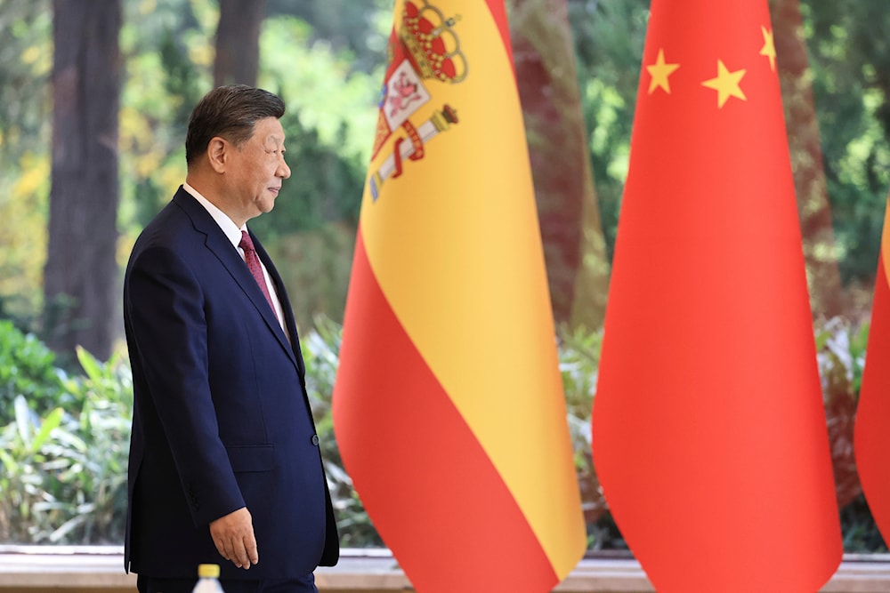 Chinese President Xi Jinping arrives for a bilateral meeting with Spanish Prime Minister Pedro Sanchez, unseen, at Diaoyutai Guest House in Beijing, China, Friday, April 11, 2025. (Andres Martinez Casares/Pool Photo via AP)