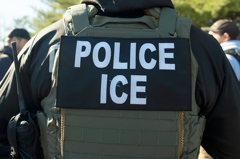 A US Immigration and Customs Enforcement officer listens during a briefing, Monday, Jan. 27, 2025, in Silver Spring, Md. (AP)