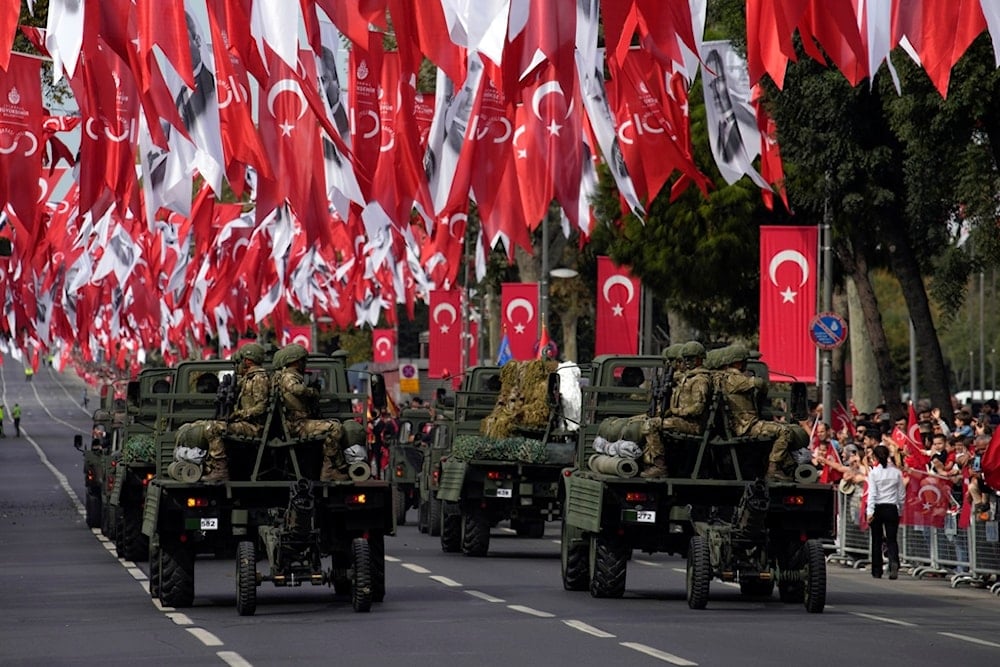 Turkey's army soldiers in a parade as part of celebrations marking the 100th anniversary of the creation of the modern, secular Turkish Republic, in Istanbul, Sunday, October 29, 2023 (AP)