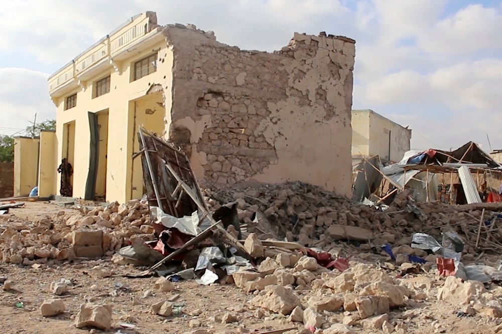 Frame grab from video shoot Wednesday, March 12, 2025, showing the aftermath of a car bomb exploded Tuesday at a hotel in the central Somali city of Beledweyne (AP)