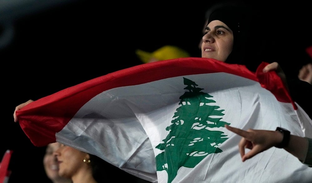 Supporters of Hady Habib of Lebanon react during his second round match against Ugo Humbert of France at the Australian Open tennis championship in Melbourne, Australia, Wednesday, Jan. 15, 2025. (AP)