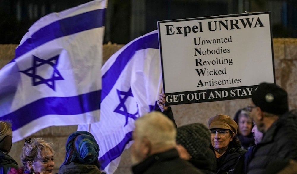 Israeli settlers protest against UNRWA in occupied al-Quds, Monday, Feb. 5, 2024. (AP)