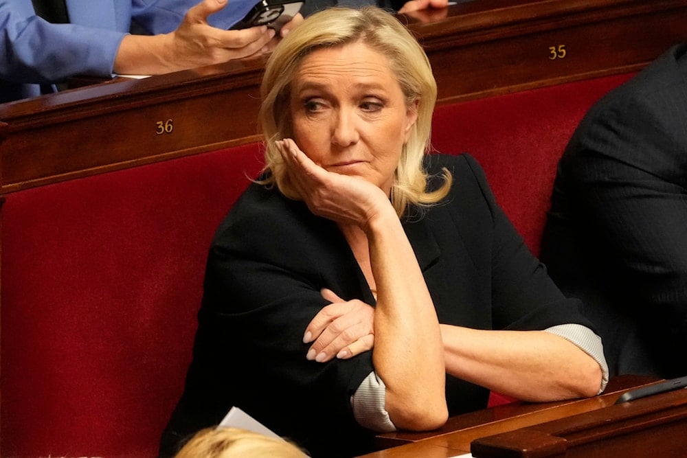 French far-right leader Marine Le Pen attends a session at the National Assembly, Tuesday, April 1, 2025 in Paris (AP)