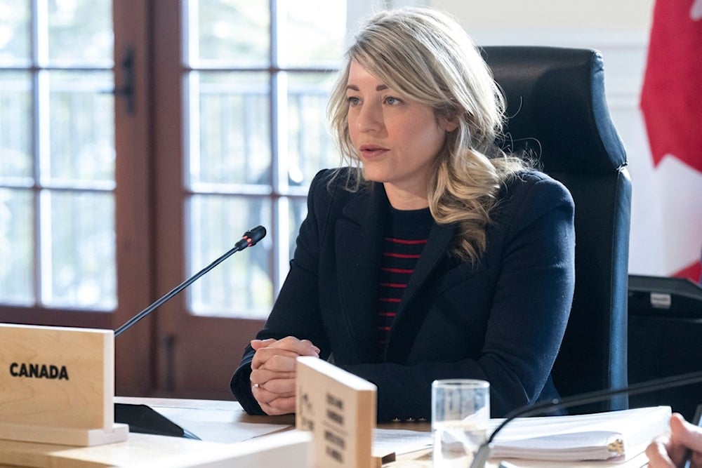 Canadian Foreign Minister Melanie Joly speaks during the G7 foreign ministers meeting in La Malbaie, Quebec, Thursday, March 13, 2025. (Saul Loeb/Pool via AP)