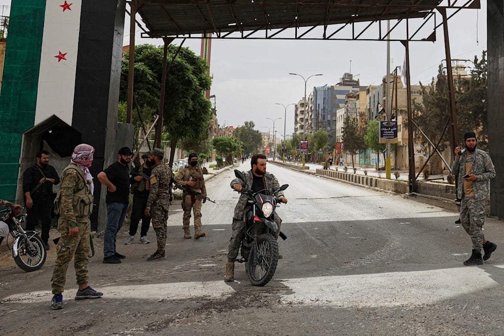 Members of Syria's security forces deploy during clashes on the outskirts of the town of Sahnaya, south of Damascus, Wednesday, April 30, 2025.(AP)