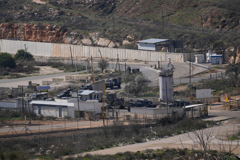 Military vehicles are lined up at the Israeli Ofer prison in the West Bank city of Beitunia, on Saturday, Feb. 1, 2025 (AP)