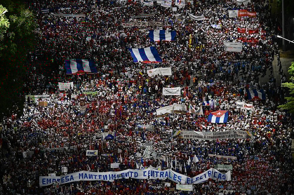 Cubans rally in Havana for Cuba’s May Day protest against US sanctions