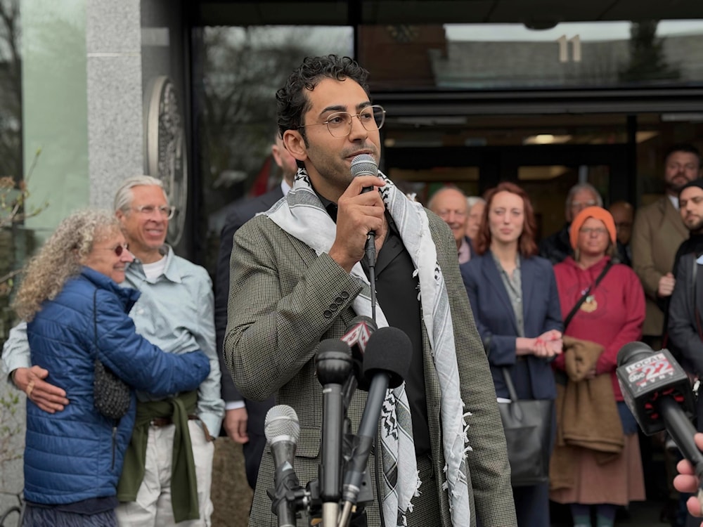Mohsen Mahdawi speaks outside the courthouse after a judge released the Palestinian student activist on Wednesday, April 30, 2025 in Burlington, Vt. (A)