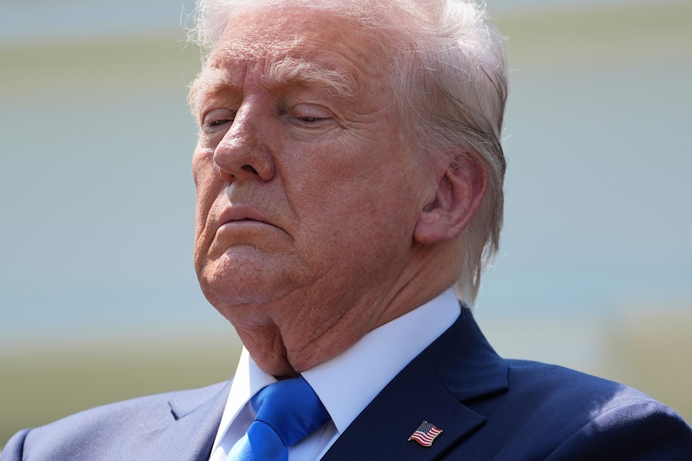 President Donald Trump listens during a National Day of Prayer event in the Rose Garden of the White House, Thursday, May 1, 2025, in Washington (AP)
