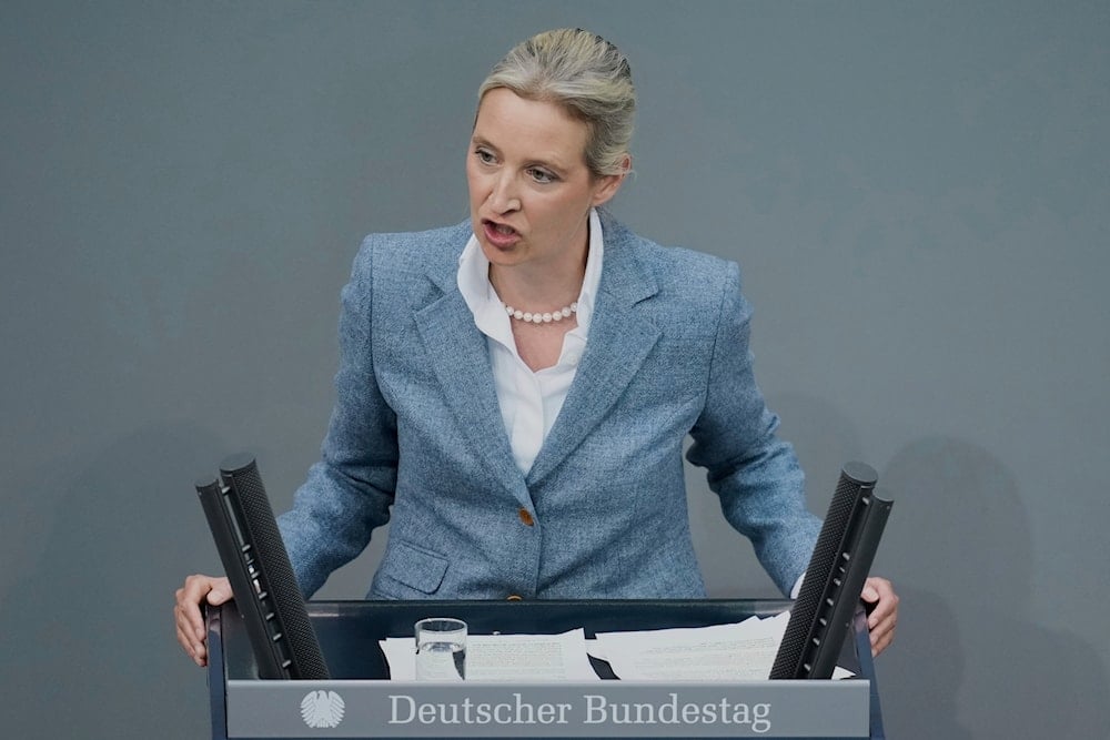 Alternative for Germany, AFD, party co-leader Alice Weidel speaks during a meeting of the German federal parliament, Bundestag, at the Reichstag building in Berlin, Germany, on March 13, 2025. (AP Photo/Ebrahim Noroozi)
