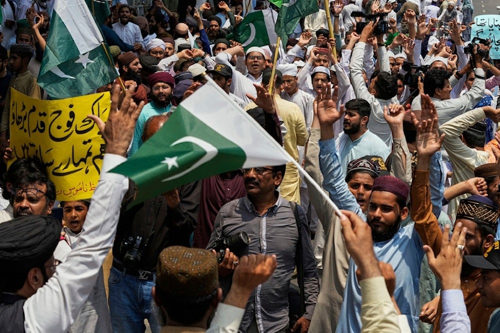 Supporters of a religious group 'Tahafuz-e-Namoos-e-Risalat Mahaz' take part in a rally to condemn Indian strikes in Pakistan and to show their support with the Pakistan Army, in Lahore, Pakistan, Saturday, May 10, 2025 (AP)