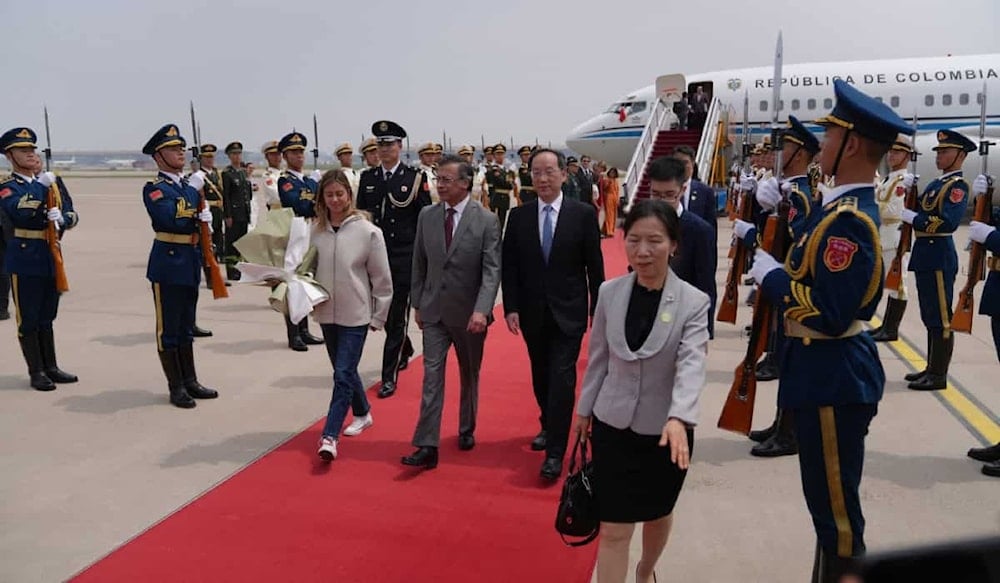 Colombian President Gustavo Petro is greeted by Chinese officials. (Agencies)