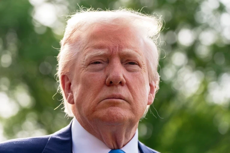 US President Donald Trump speaks with reporters as he and first lady Melanie Trump depart on Marine One from the south Lawn of the White House, April 25, 2025, Washington (AP/Alex Brandon)