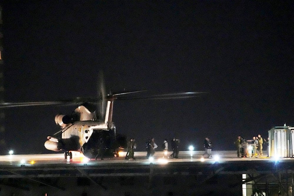 An Israeli military helicopter carrying freed captive Israeli-American soldier Edan Alexander who has been held by Hamas in Gaza since October 7, 2023, arrives at Ichilov Hospital helipad in Tel Aviv, occupied Palestine, on Monday, May 12, 2025 (AP) 