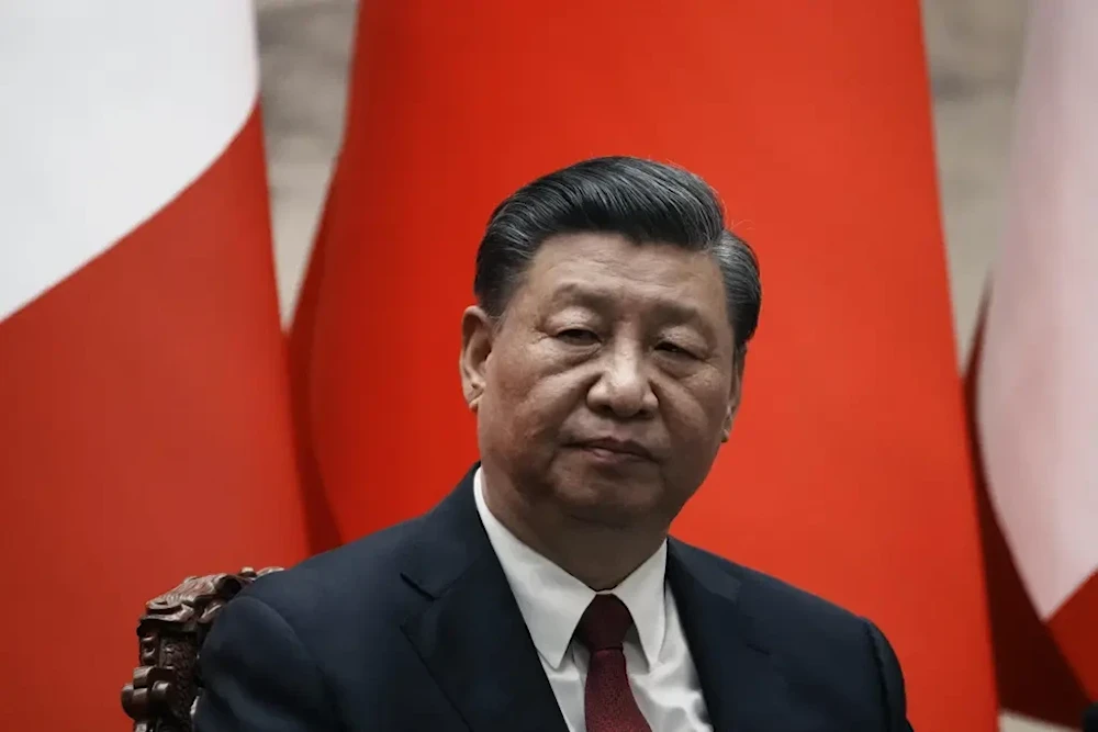 Chinese President Xi Jinping gives a joint press conference at the Great Hall of the People in Beijing, China on April 14 (AP/Thibault Camus)