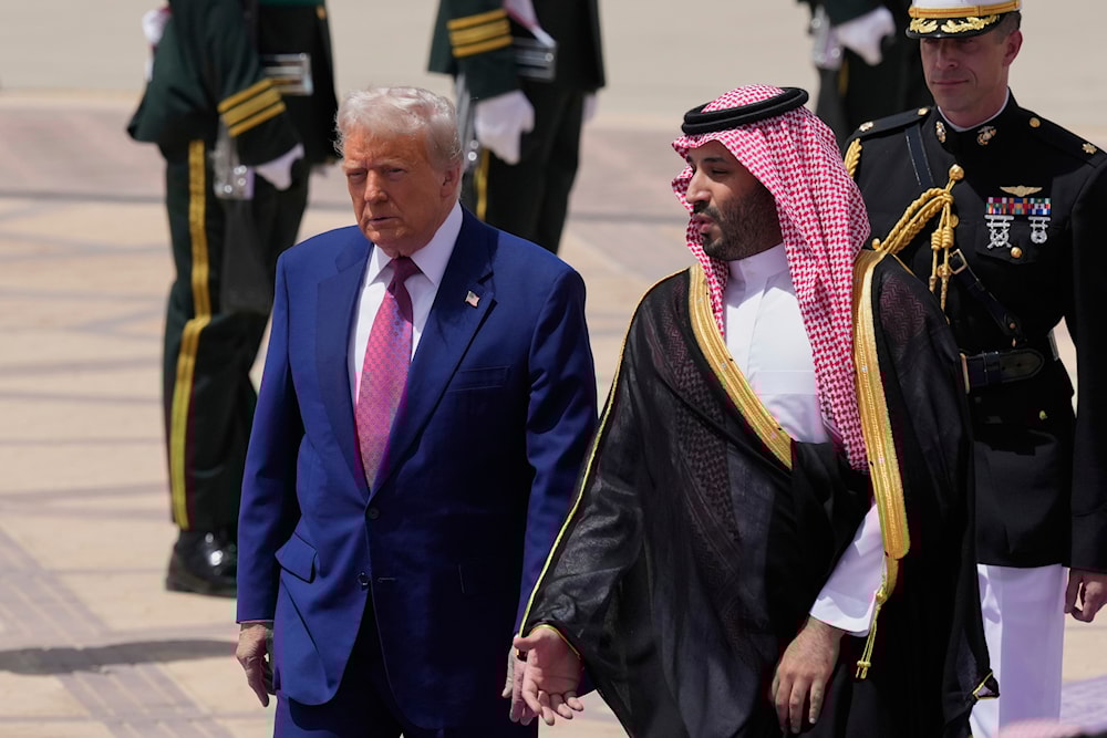 President Donald Trump speaks with Saudi Crown Prince Mohammed bin Salman during an arrival ceremony at the Royal Terminal of King Khalid International Airport in Riyadh, Saudi Arabia, on May 13, 2025. (AP Photo/Alex Brandon)