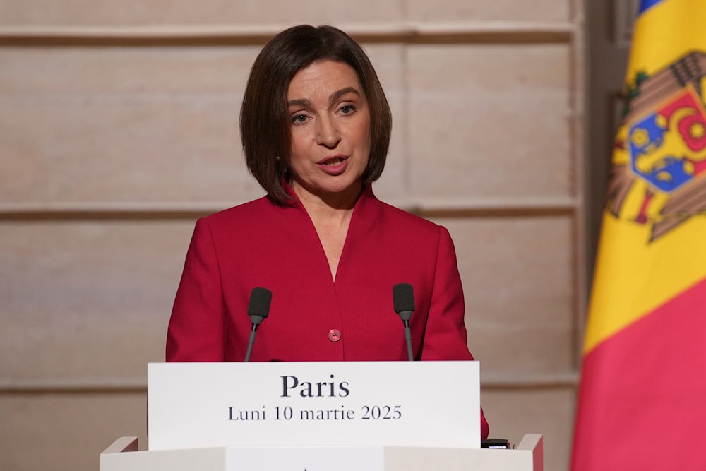Moldova's President Maia Sandu speaks during a joint statement with French President Emmanuel Macron, Monday, March 10, 2025 at the Elysee Palace in Paris. (AP)