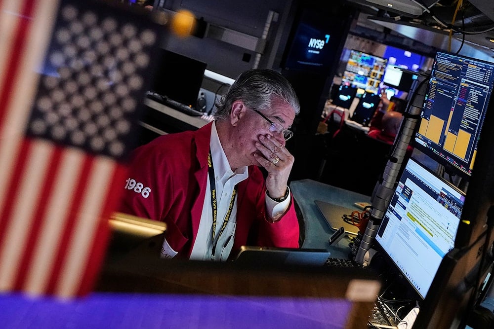 Trader Daniel Kryger works on the floor of the New York Stock Exchange on May 5, 2025. (AP Photo/Richard Drew, File)