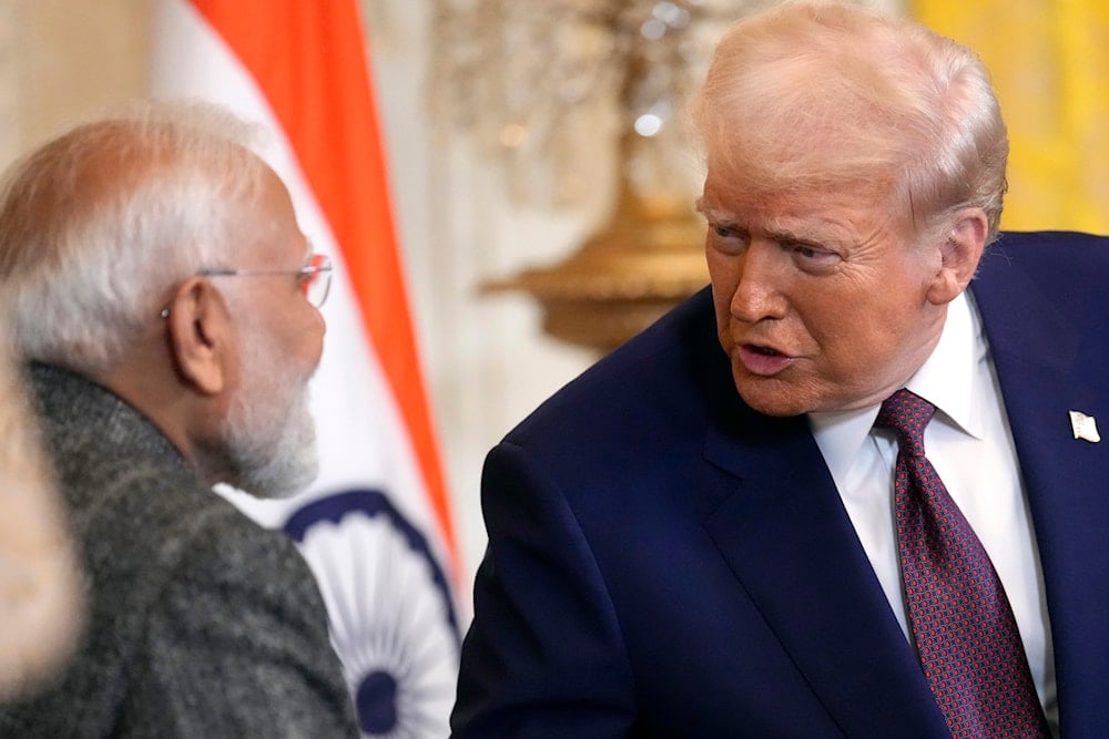 President Donald Trump, speaks with India's Prime Minister Narendra Modi during a news conference in the East Room of the White House, Thursday, Feb. 13, 2025, in Washington (AP)