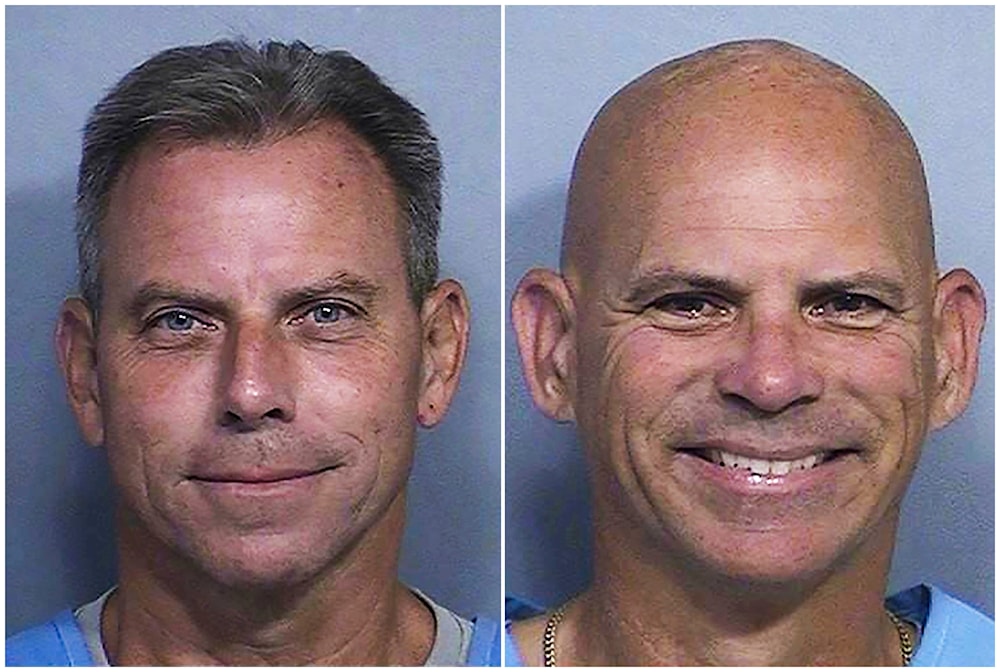 This combination of two booking photos provided by the California Department of Corrections shows Erik Menendez, left, and Lyle Menendez. (California Dept. of Corrections via AP, File)