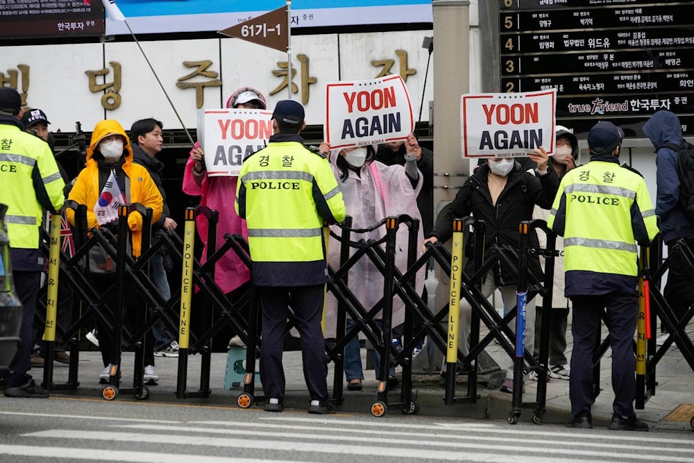 South Korea jails two over courthouse riot linked to ex-president