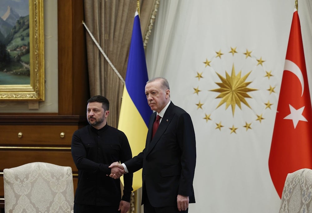 Turkish President Recep Tayyip Erdogan, right, shakes hands with his Ukrainian counterpart Volodymyr Zelenskyy during their meeting at the Presidential palace in Ankara, Thursday, May 15, 2025 (AP)