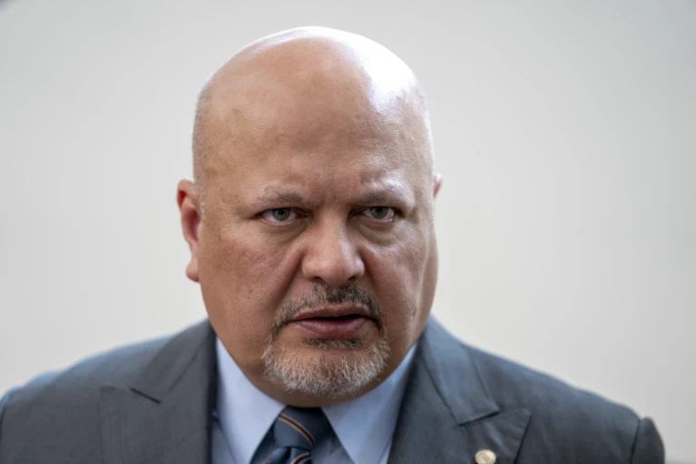 Karim Khan, Prosecutor of the International Criminal Court looks up prior to a press conference in The Hague, Netherlands, July 3, 2023 (AP/Peter Dejong)