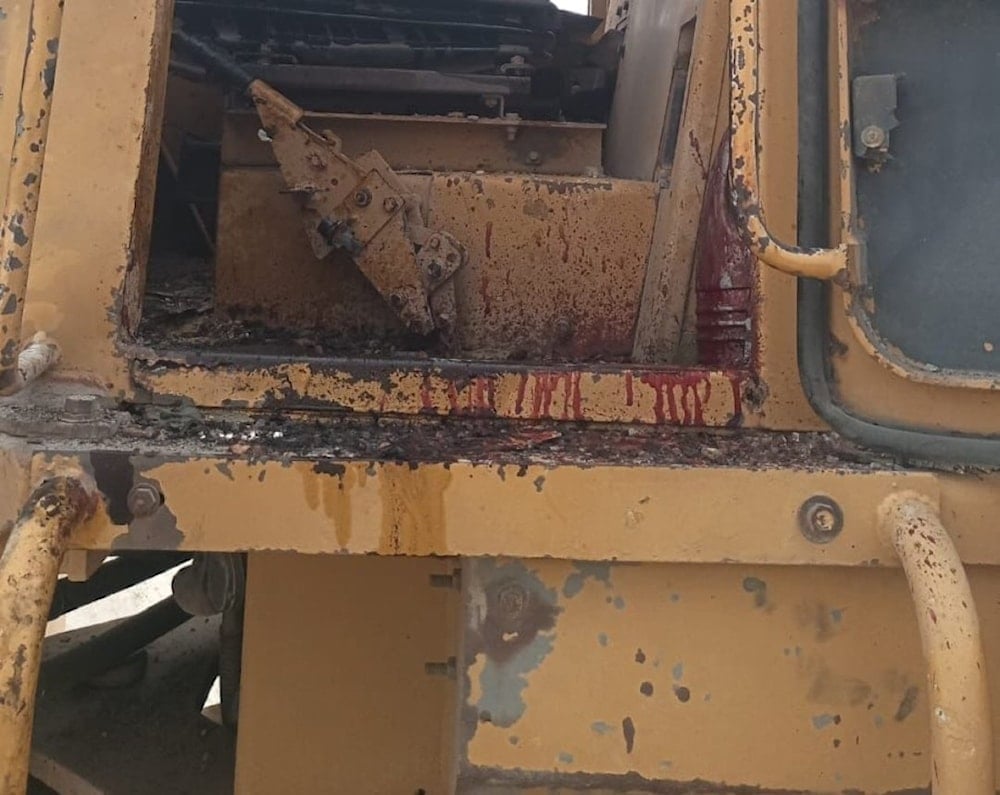 Blood splattered on a construction vehicle targeted by the Israeli occupation, killing one person, in Arnoun, Lebanon (Social media)