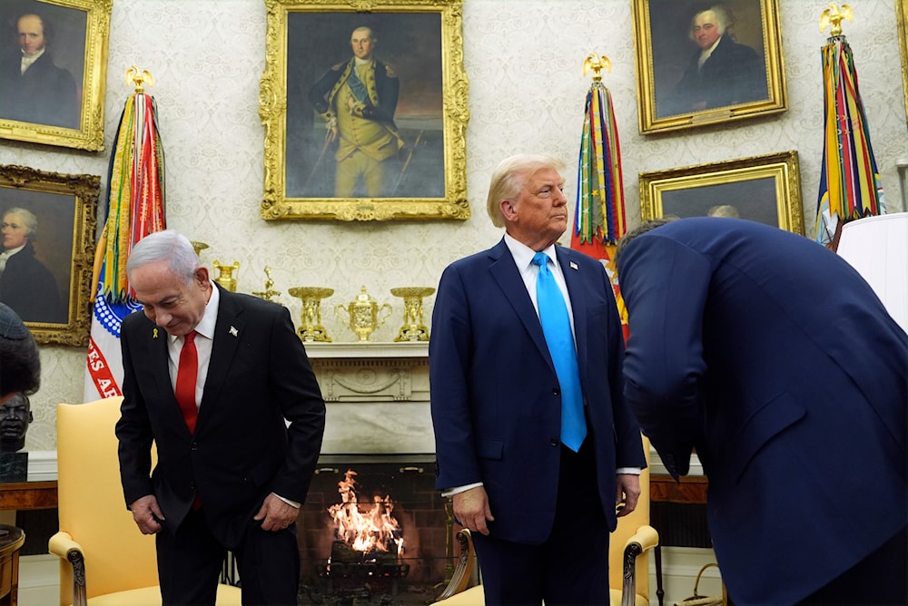 President Donald Trump and Israel's Prime Minister Benjamin Netanyahu prepare to sit for a meeting in the Oval Office of the White House, Tuesday, Feb. 4, 2025, in Washington. At right is Vice President JD Vance. (AP Photo/Evan Vucci)