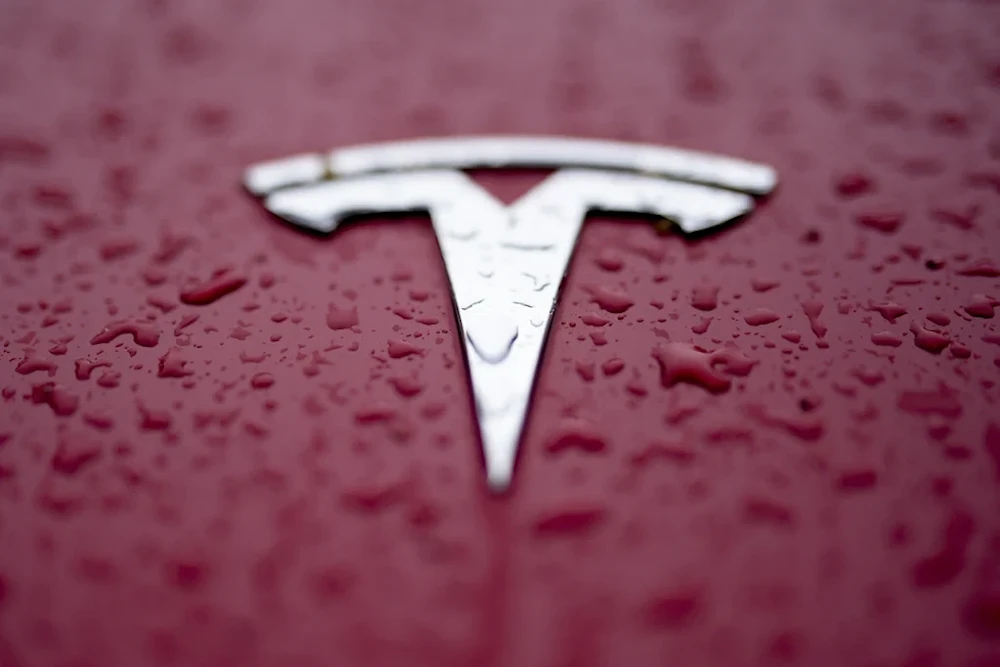 A Tesla logo is shown on February 27, 2024, in Charlotte, NC (AP/Chris Carlson)