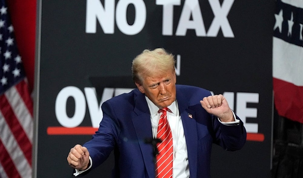 Republican presidential nominee former President Donald Trump dances at a campaign event at the Cobb Energy Performing Arts Centre, Oct. 15, 2024, in Atlanta. (AP)