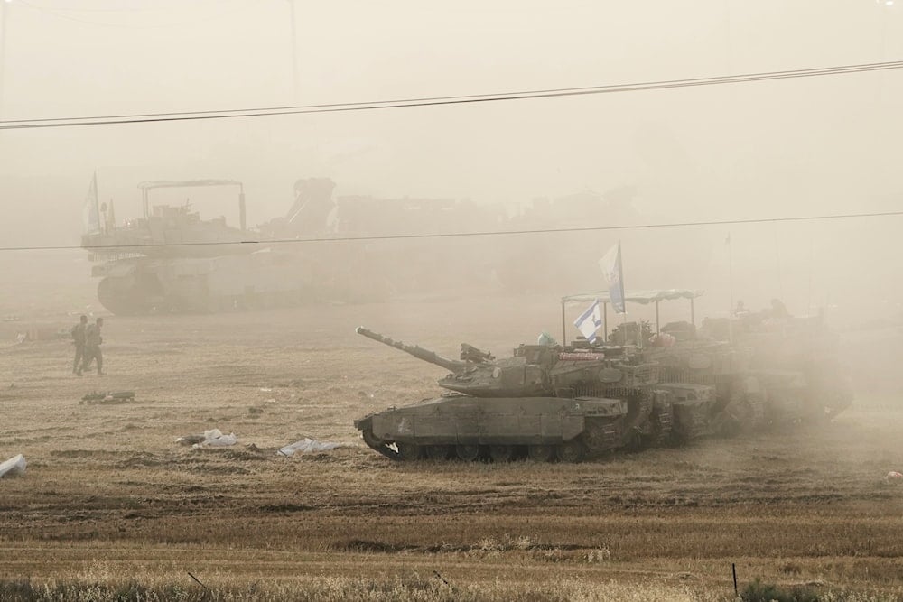 Israeli occupation’s tanks parked in a staging area near the border with Gaza, Friday, May 16, 2025. (AP)