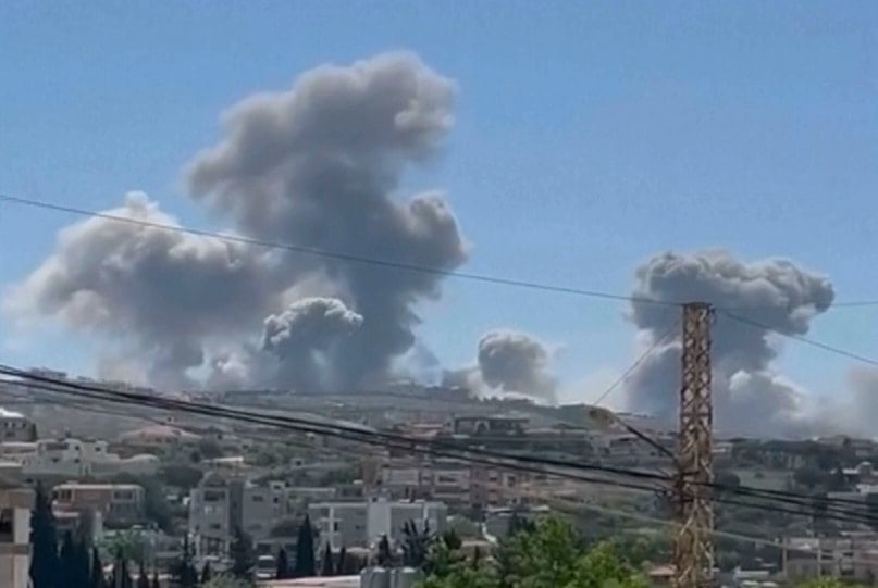 This frame grab from a video provided on Thursday, May 8, 2025, shows smoke rise following Israeli airstrikes that targeted hilltops near Nabatieh town, south Lebanon. (AP)