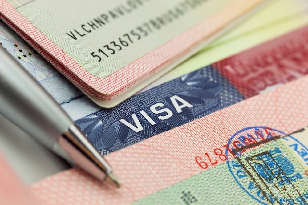 A stamp on an EU VISA appears by a pen in this undated photo (AP/European Union-EP)