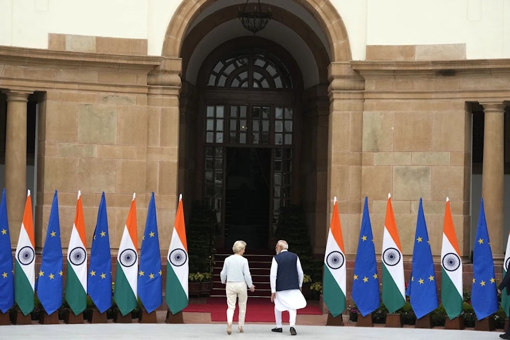 Indian Prime Minister Narendra Modi talks to European Commission President Ursula von der Leyen as they leave for their delegation level meeting in New Delhi, India, February 28, 2025 (AP/Manish Swarup)