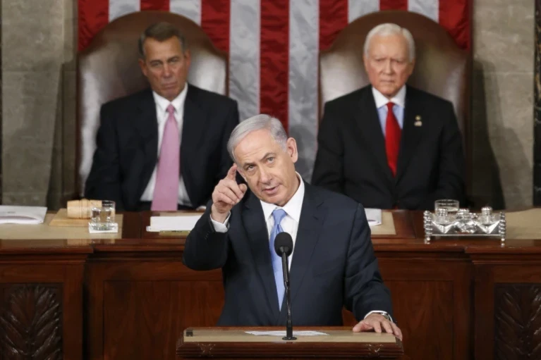 Israeli Prime Minister Benjamin Netanyahu gestures while speaking before a joint meeting of Congress on Capitol Hill in Washington, March 3, 2015 (AP Photo/Andrew Harnik) 