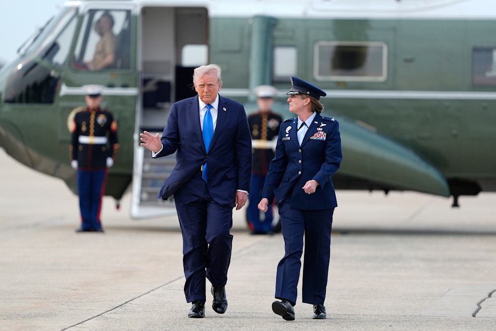 President Donald Trump walks with Air Force Col. Angela Ochoa, Commander of the 89th Airlift Wing from Marine One to board Air Force One at Joint Base Andrews, Md., en route Tuscaloosa National Airport, Thursday, May 1, 2025. (AP)