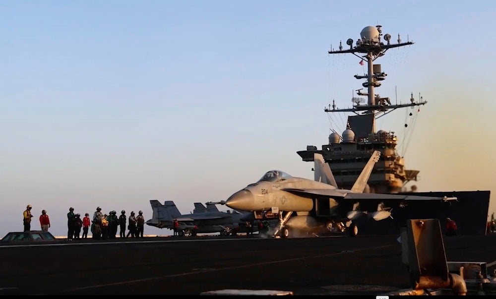 This image taken from video provided by the U.S. Navy shows an aircraft launching from the USS Harry S. Truman in the Red Sea before airstrikes in Sanaa, Yemen, Saturday, March 15, 2025 (AP)