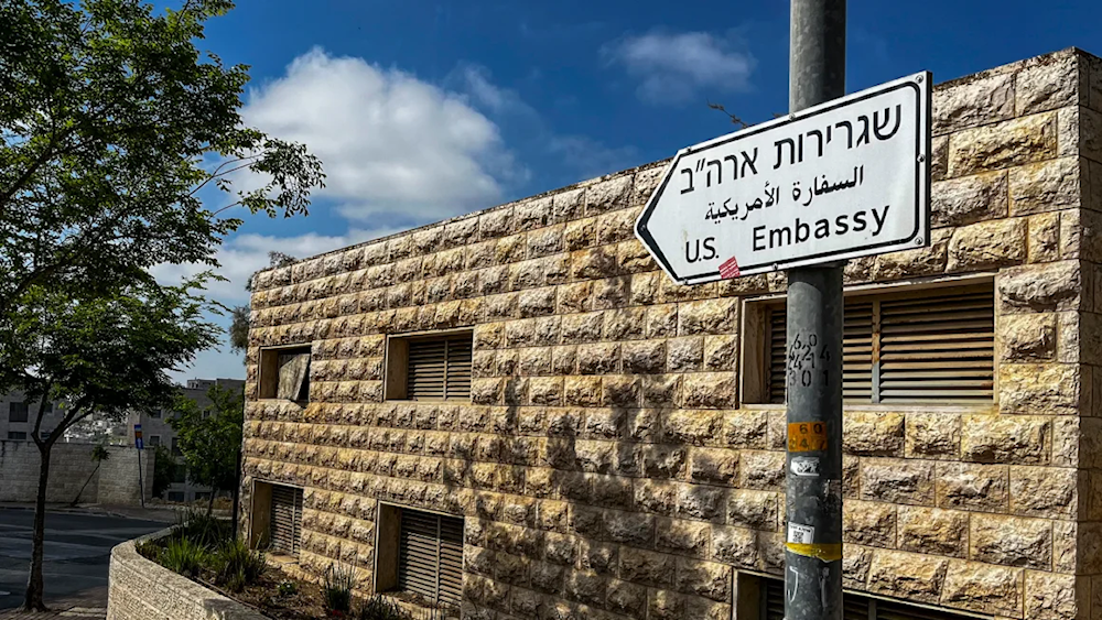 A road sign shows the way towards the US embassy in Jerusalem on April 19 (Ronaldo Schemidt/AFP)