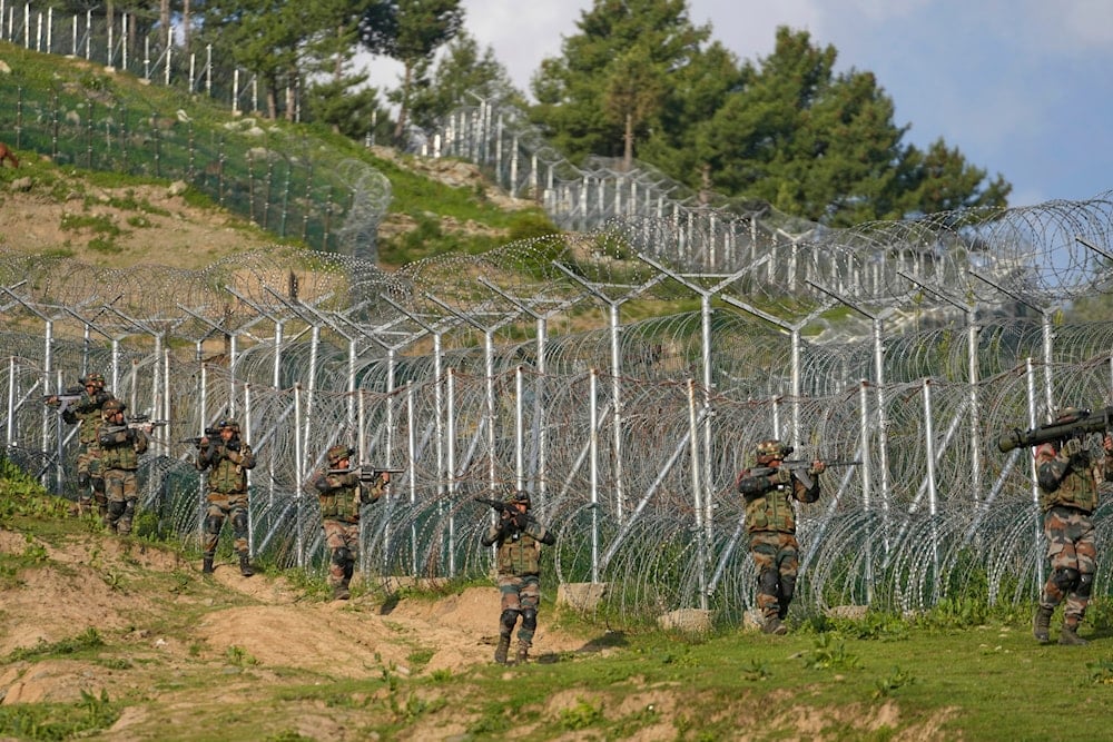  Indian army soldiers display military drill along the line of control between India and Pakistan during a media tour somewhere in north of Indian-controlled Kashmir, Monday, May 19, 2025. (AP)