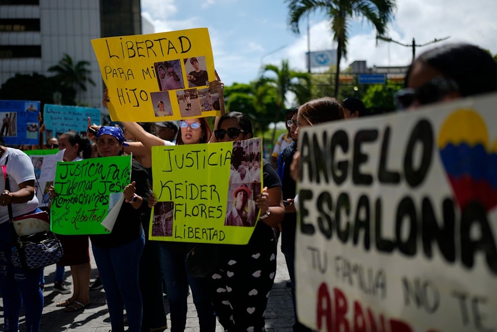Relatives of Venezuelan migrants deported by the US to a Salvadoran prison protested outside the UN building in Caracas on April 9, 2025 (AP)