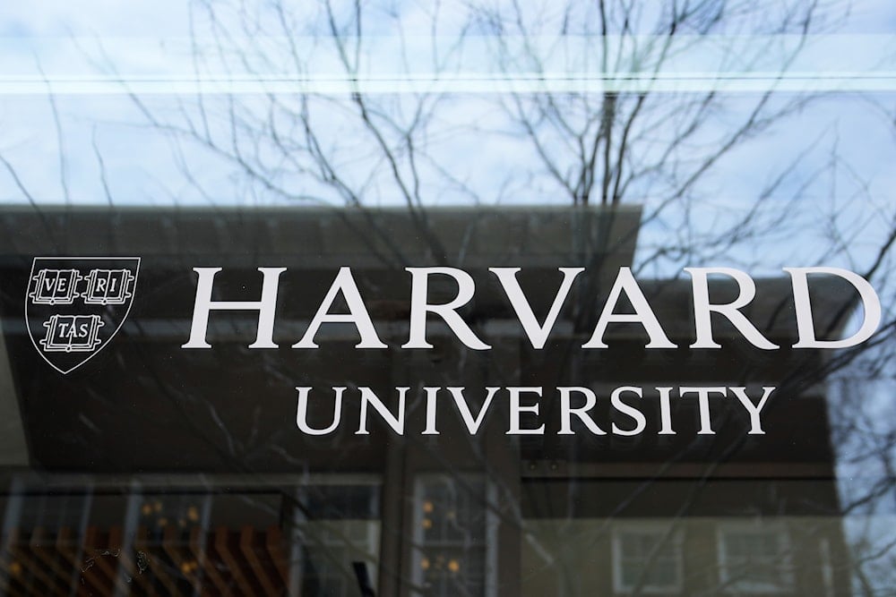The Harvard University logo is displayed on a building at the school, Tuesday, April 15, 2025, in Cambridge, Mass. (AP)